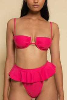 Hot pink bikini bottom with ruffle detail across the front.
