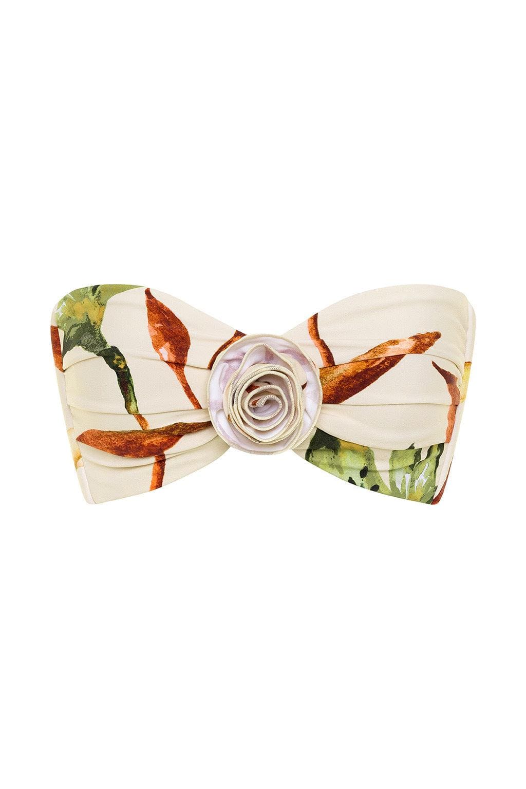 Bandeau bikini top with floral print featuring red and orange flowers on cream fabric, centered with a decorative rose-shaped