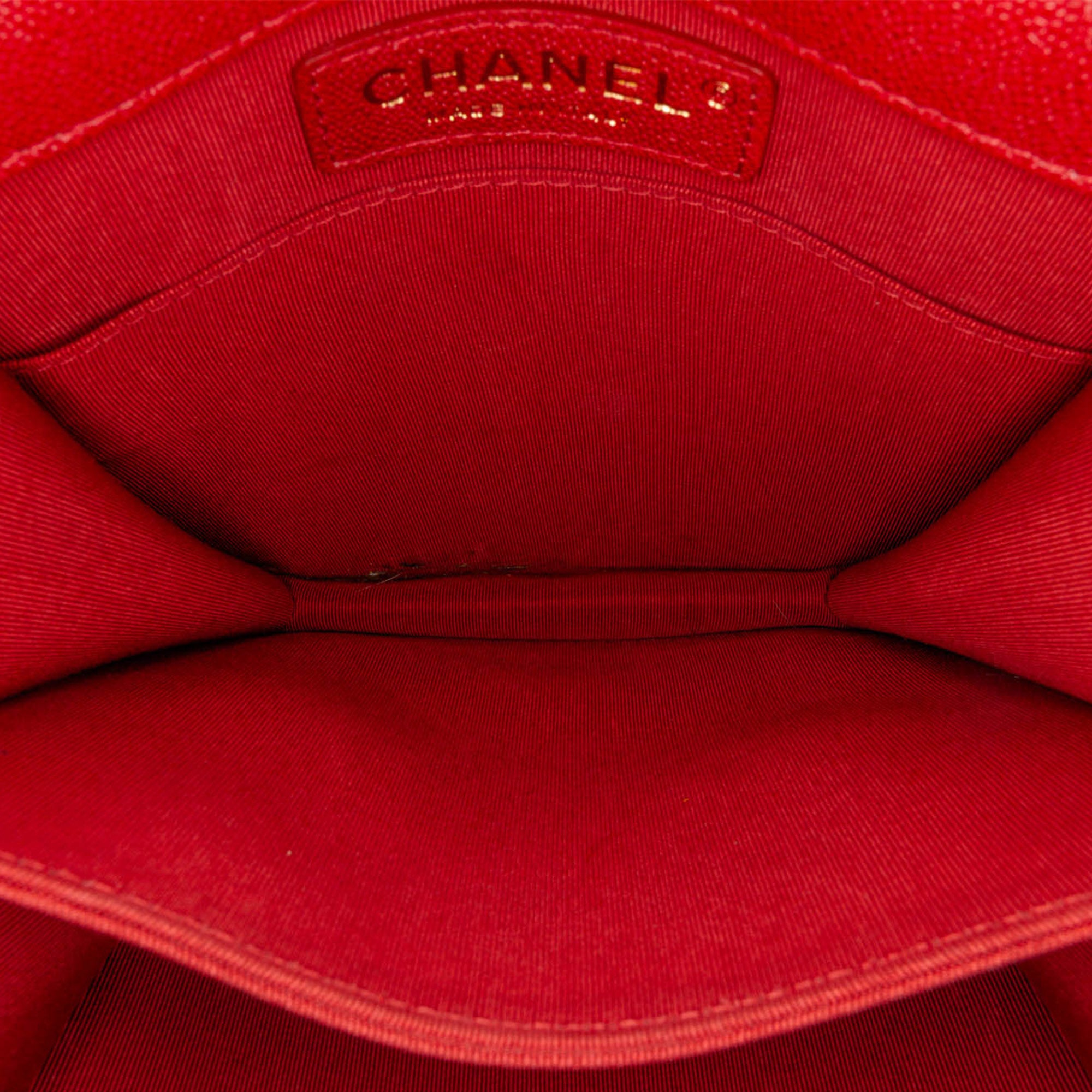 Chanel | Pre-Owned Quilted Caviar North South Boy Flap | Red