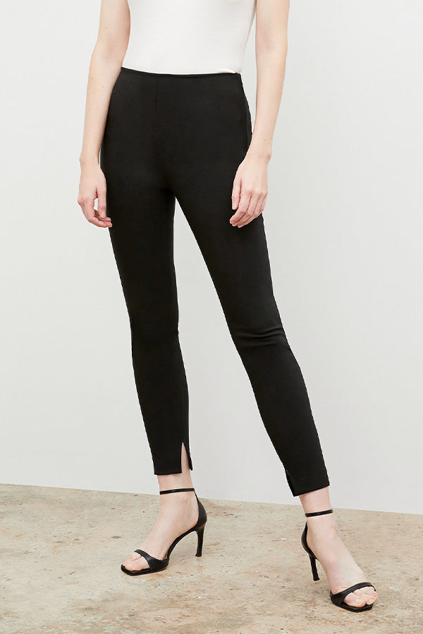 Side image of a woman wearing the skinny foster in black | Exclude 