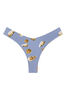 Blue bikini bottom with gold and white shell print and zig-zag stitching detail on waistband.
