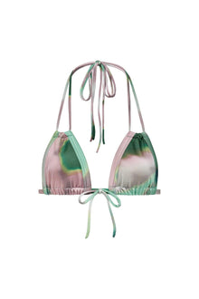 Tie-dye bikini top in pink and green with adjustable shoulder and bottom straps with bow closures.