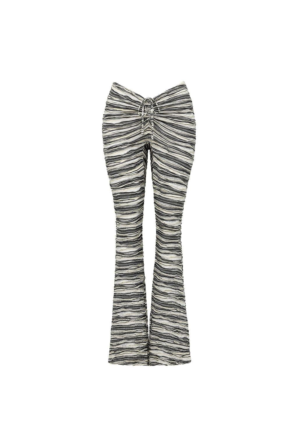 Black and white striped flared legging with ruched center panel and gathered waistband detail.