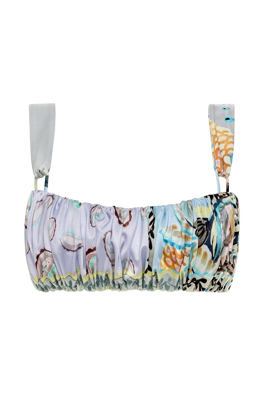 Bikini top with multicolored floral print, ruched front, and adjustable shoulder straps with fabric panels.