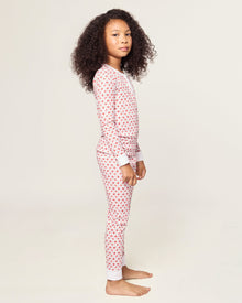 Kid's Pima Snug Fit Pajama Set in Autumn Orchards: two-piece set with long sleeves and pants, featuring a red flower pattern on a white background with solid white cuffs and neckline.