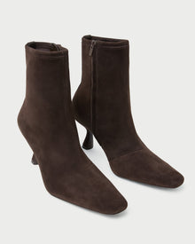Thandy Brown Suede Curved Heel Bootie in brown suede.
