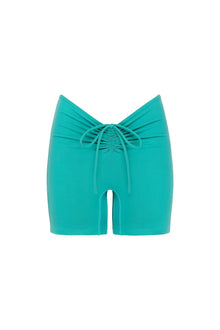 Teal shorts with a front cutout and drawstring tie closure at the waist.
