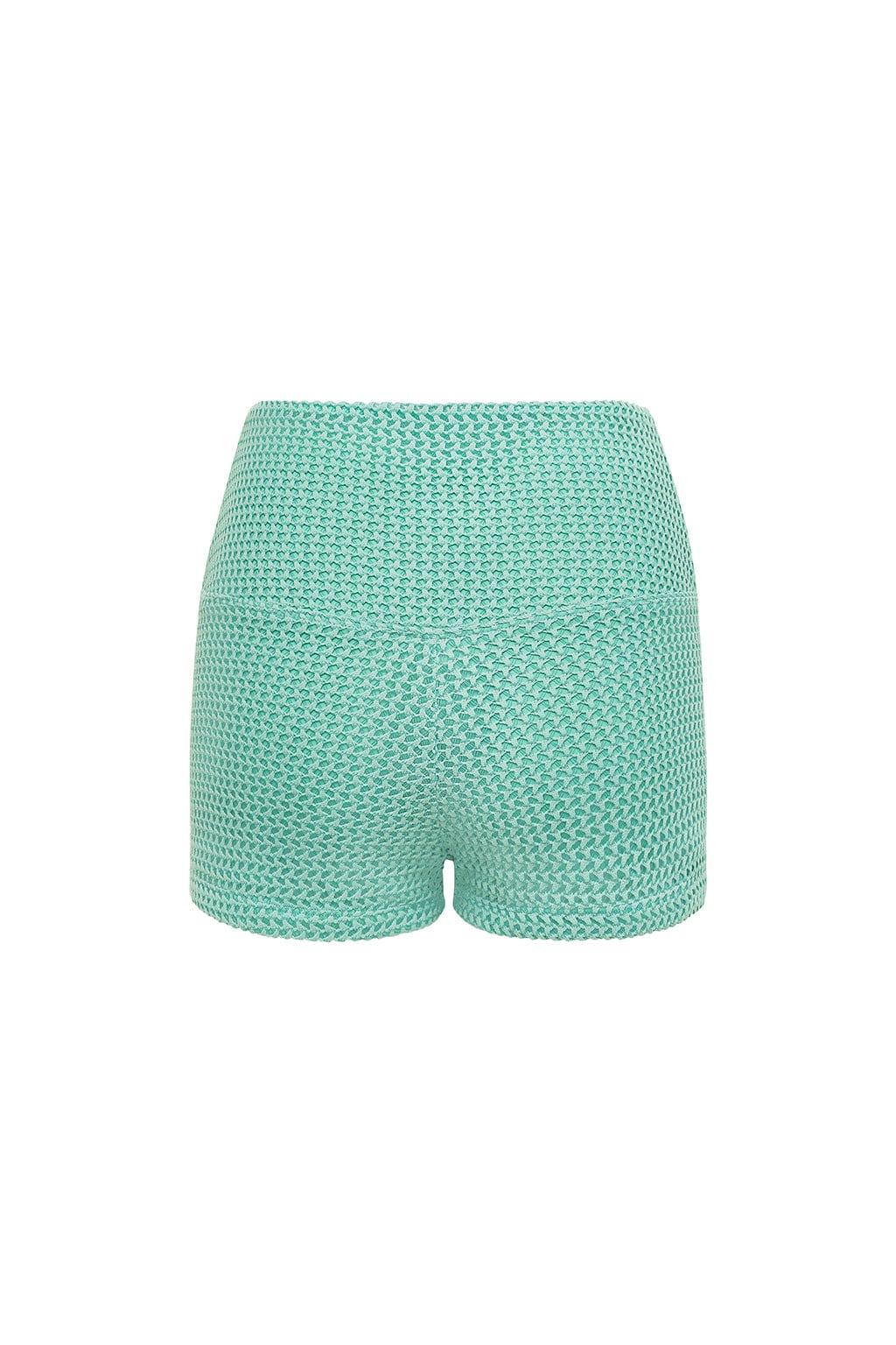Turquoise crochet micro shorts with textured knit pattern shown from back view.