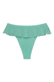 Turquoise crochet bikini bottom with ruffled waistband and textured knit fabric.