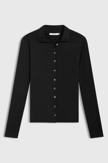 Black button up top on a light grey background