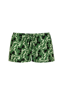 Green and cream floral patterned shorts with black accents and drawstring waistband.