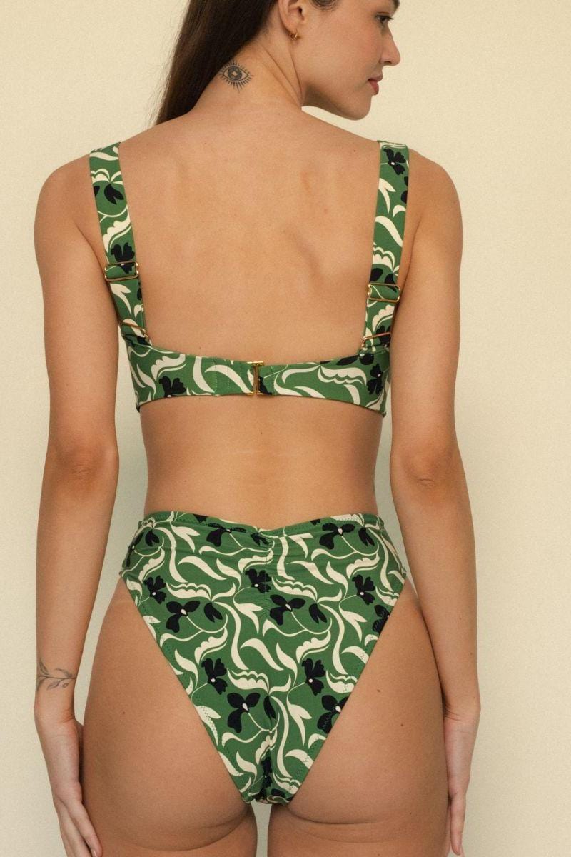 Green and cream floral print bikini bottom with black accents, shown from back view.