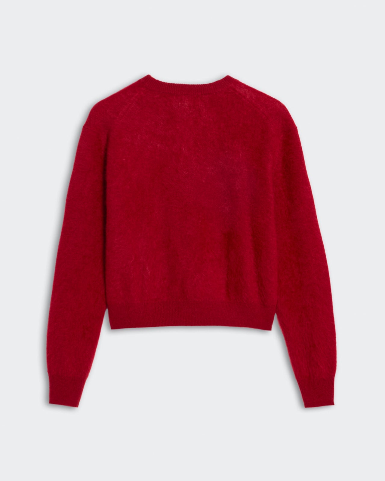 Back view of Grizzly Crew - Ruby red long sleeve soft knit sweater on plain background