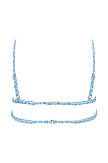 Blue and white wave-patterned bikini top with adjustable straps and gold-tone hardware, shown from back view.