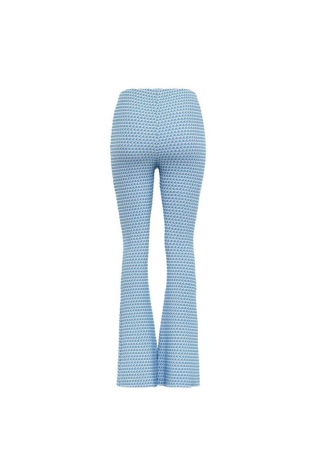 Blue and white textured flare pants with wave pattern throughout.