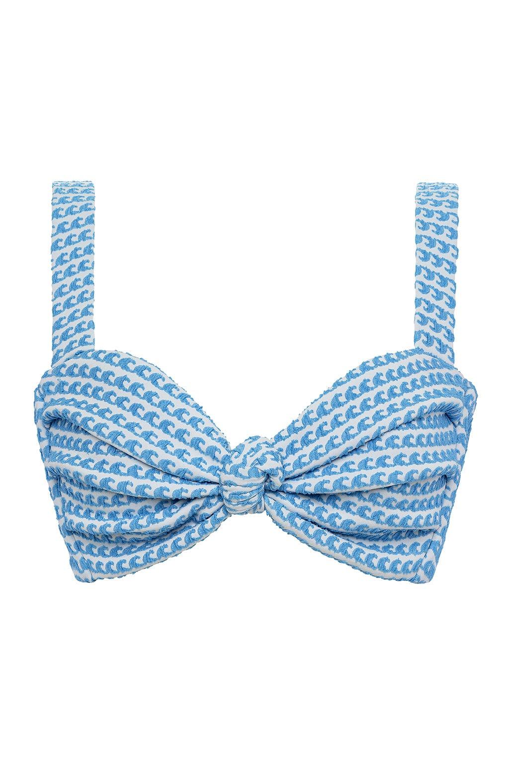 Blue and white wave print bikini top with bow-tie center and adjustable shoulder straps.