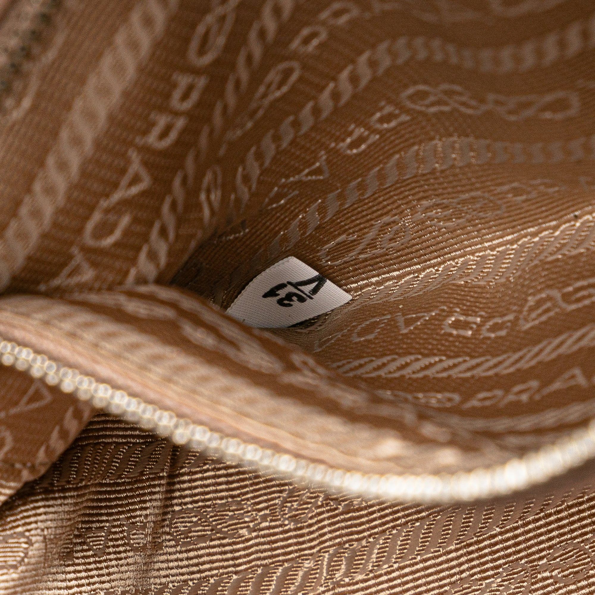 Prada | Pre-Owned Soft Calf Diagramme Crossbody | Brown