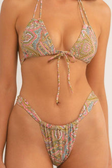 Paisley-patterned bikini bottom in pink, gold, and teal with gathered ruching at the sides.