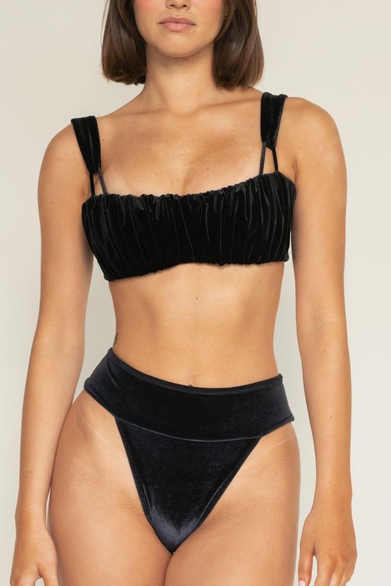 Black velvet bikini bottom with bound waistband and high-cut leg design.