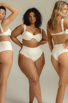 Cream ribbed underwire bikini top with sweetheart neckline and adjustable straps, shown on three models from front and back v