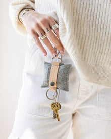 The Pod Fob holds your keys and pods. Here in granite color