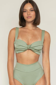 Sage green ribbed bikini top with square neckline, knot center detail, and wide shoulder straps.