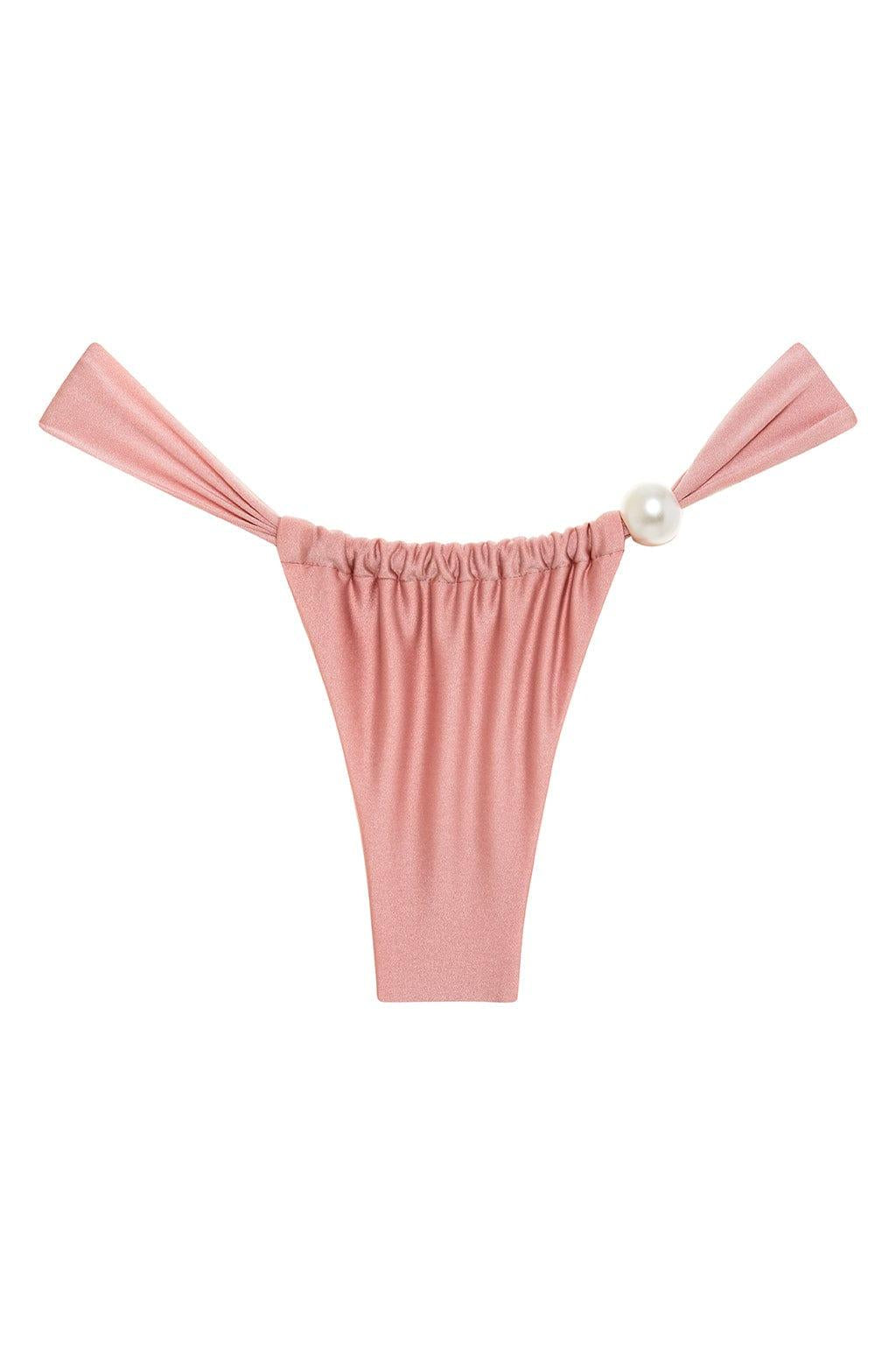 Rose pink bikini bottom with ruched front, tie-side straps, and pearl accent closure.