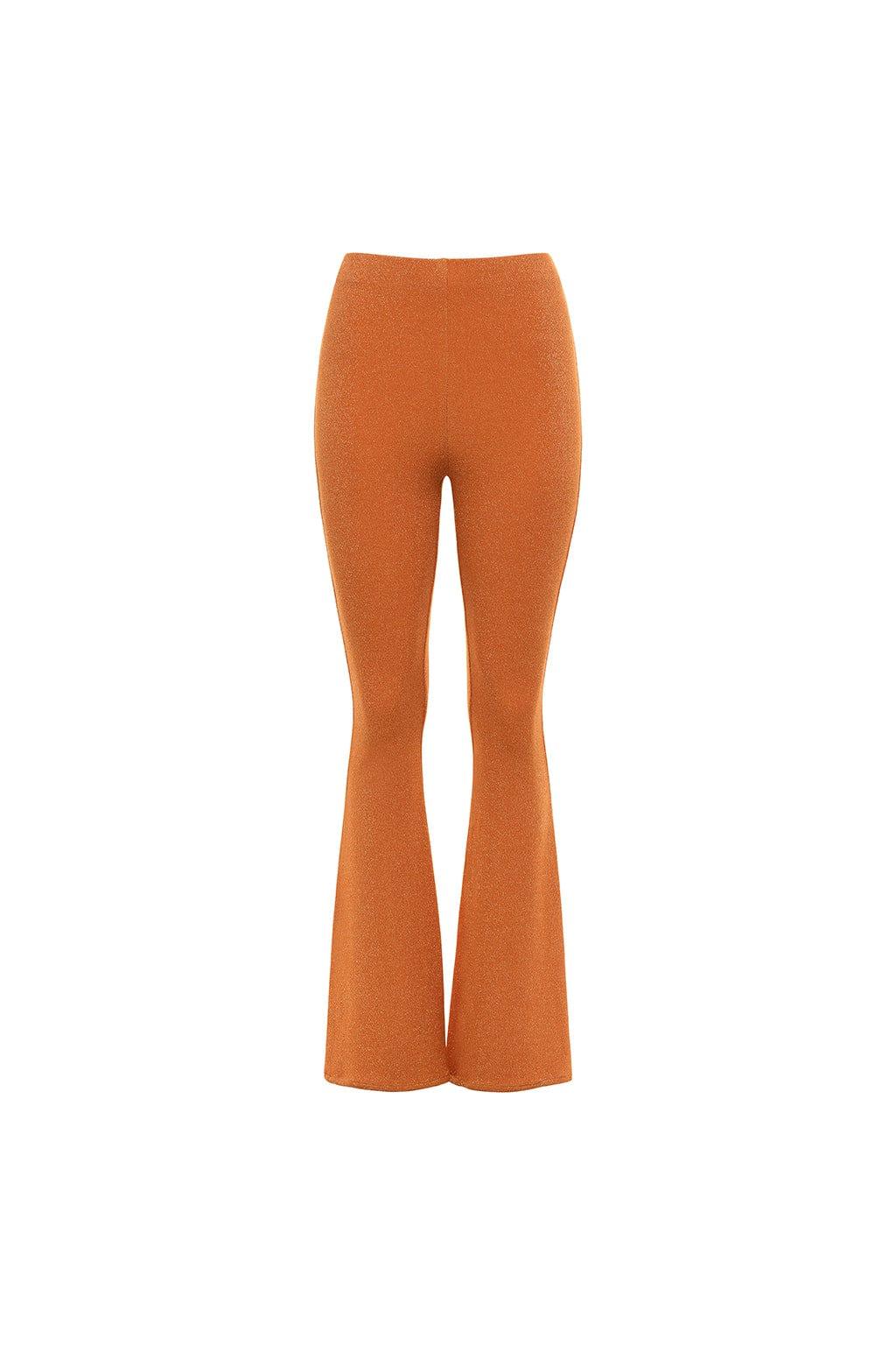 Burnt orange flare pants with a sparkly textured fabric and high waistband.