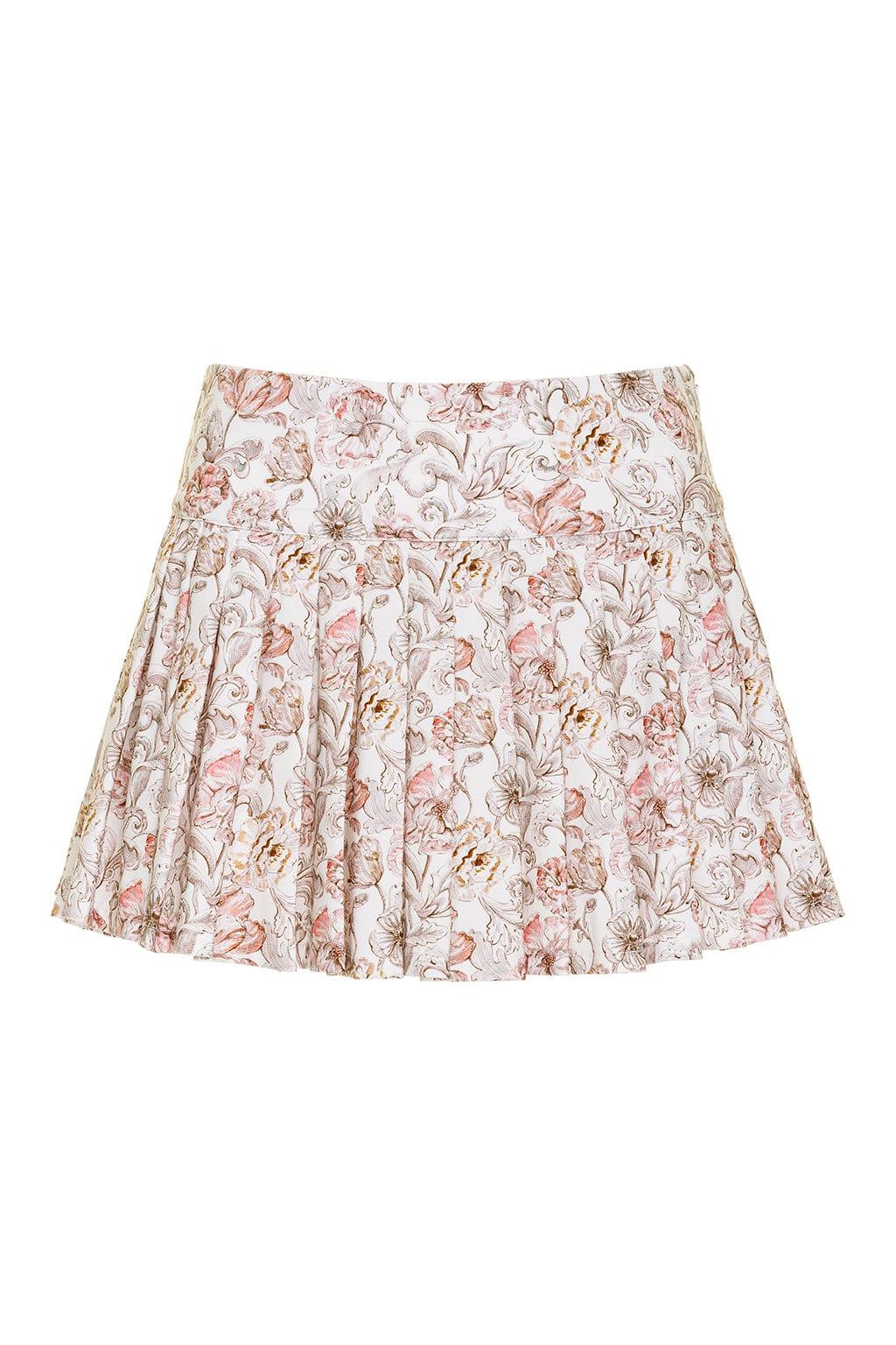 White pleated tennis skirt with pink, brown, and gold floral pattern throughout.