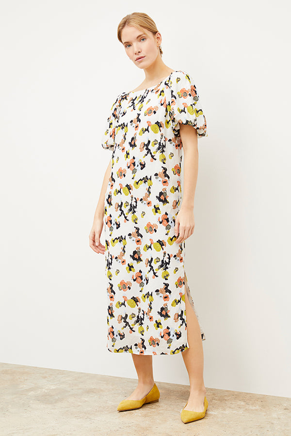Front image of a woman wearing the Gali dress in meadow print linen | Exclude