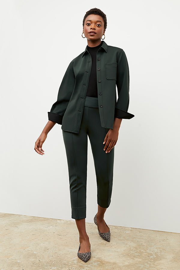 Front image of a woman wearing the robin pant in forest | Exclude